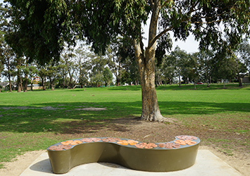A park with trees and bench