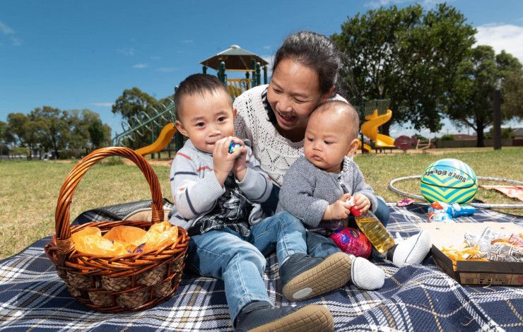 Mother and children in park