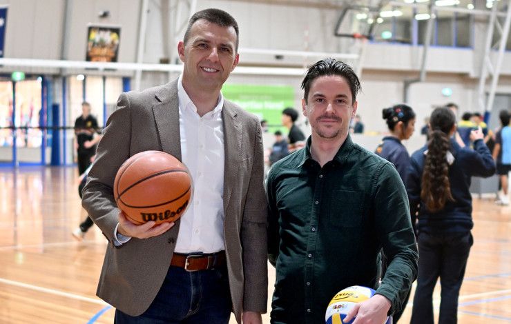 Cr Bob Milovich with another staff member at the basketball stadium