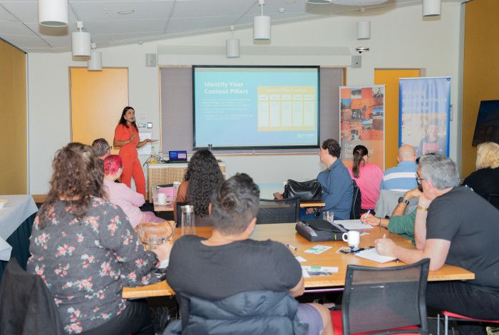 Presenter Clarrisa Harris with workshop particpants from previous workshop