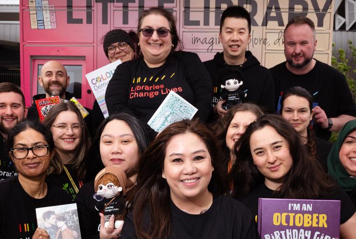 Cr Sophie Tan and Library staff in front of the Little Library