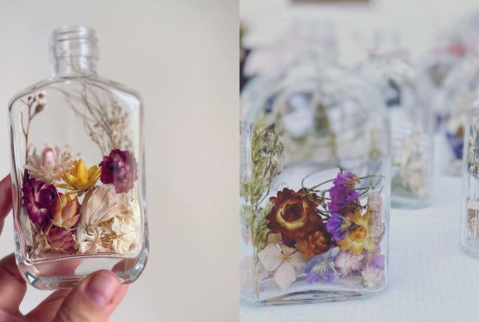 Glass bottles with dried flowers
