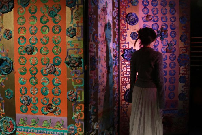 Person walking through The Maze