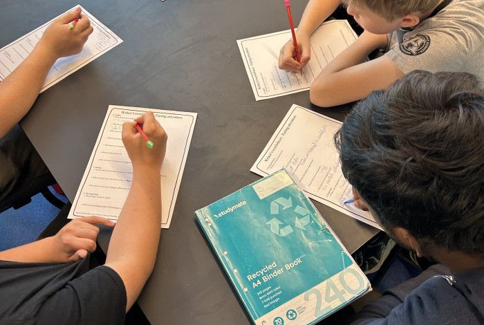 group of young people at creative writing workshop