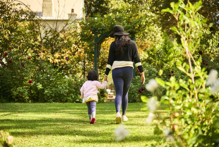 Mother and child walking around Heritage hill