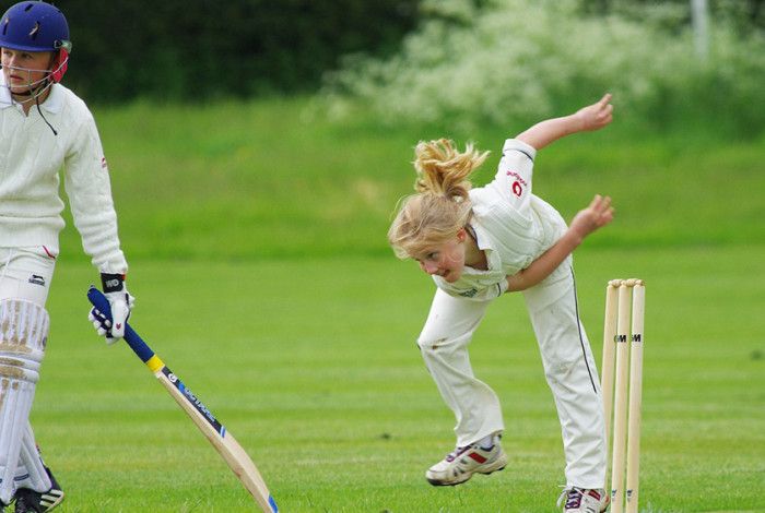 Kids playing cricket