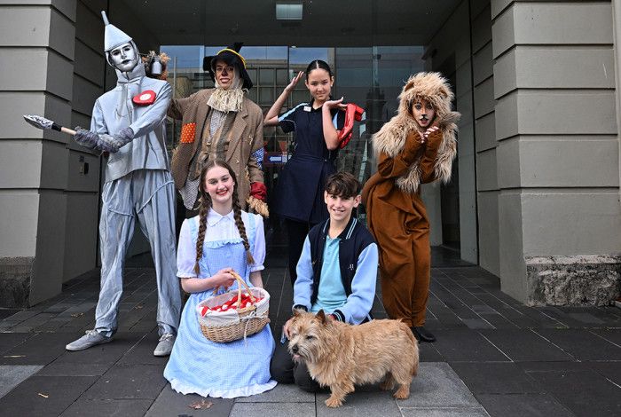 People dressed as Wizard of Oz costumes in front of the Drum Theatre