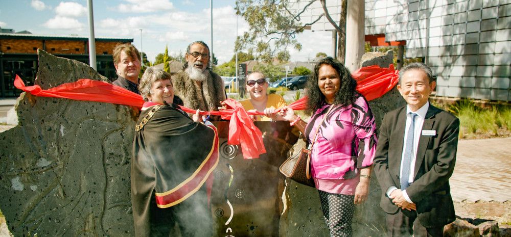 Ribbon cutting at unveiling