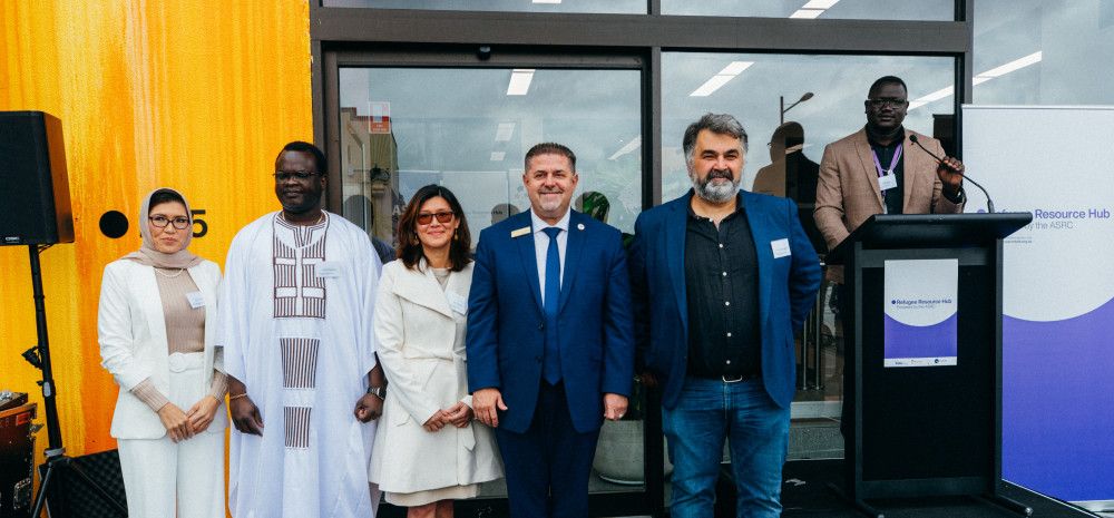 People at the refugee Resource Hub opening