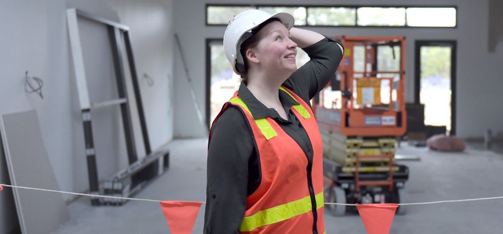 Coordinator Building Projects, Samantha Ackland lady looking at a project