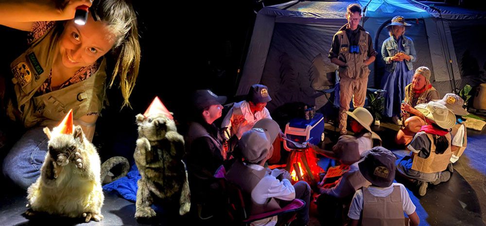 Camping tent and mock fire in a theatre