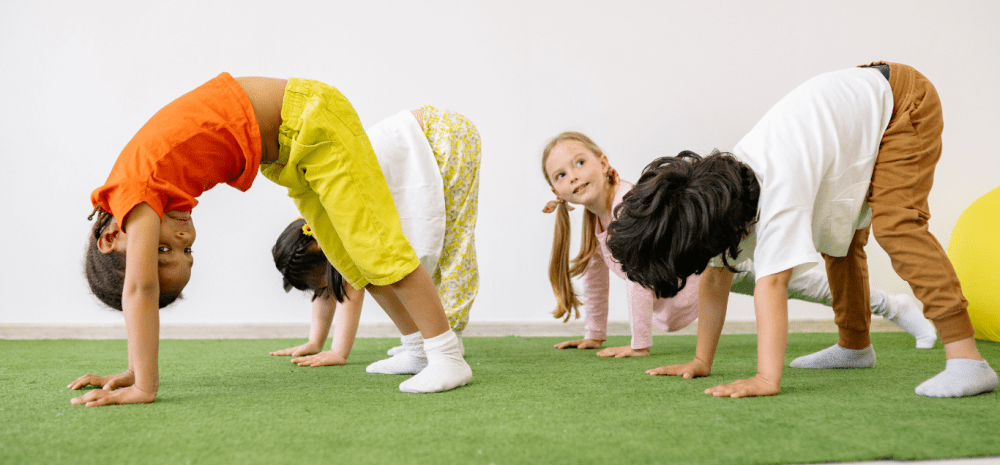 Children doing gymnastics crawling