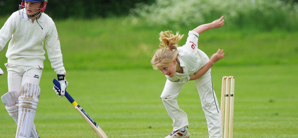 Kids playing cricket
