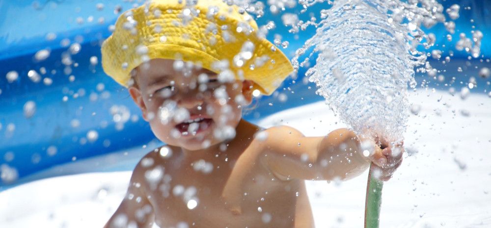 a child in a pool 