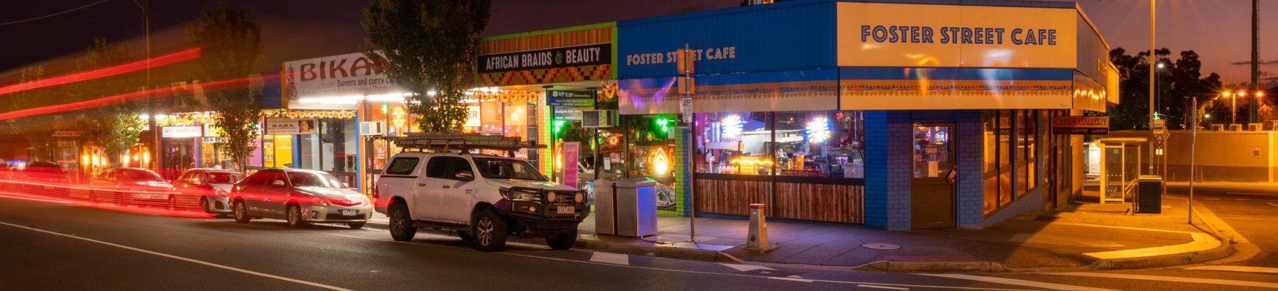 a street in Dandenong lit up at night