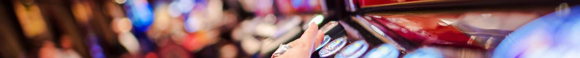 person playing gambling machine