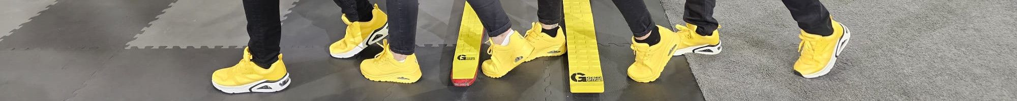 Four people with yellow shoes