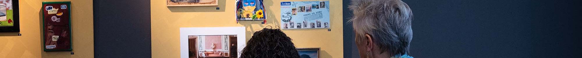 People looking at an exhibition