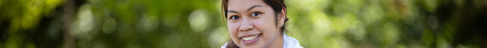 Councillor Melinda Yim exercising in a park