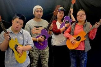 people holding guitars