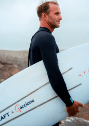 Man holding a surfboard